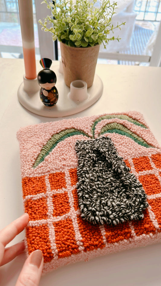 Hand tufted framed wall hanging